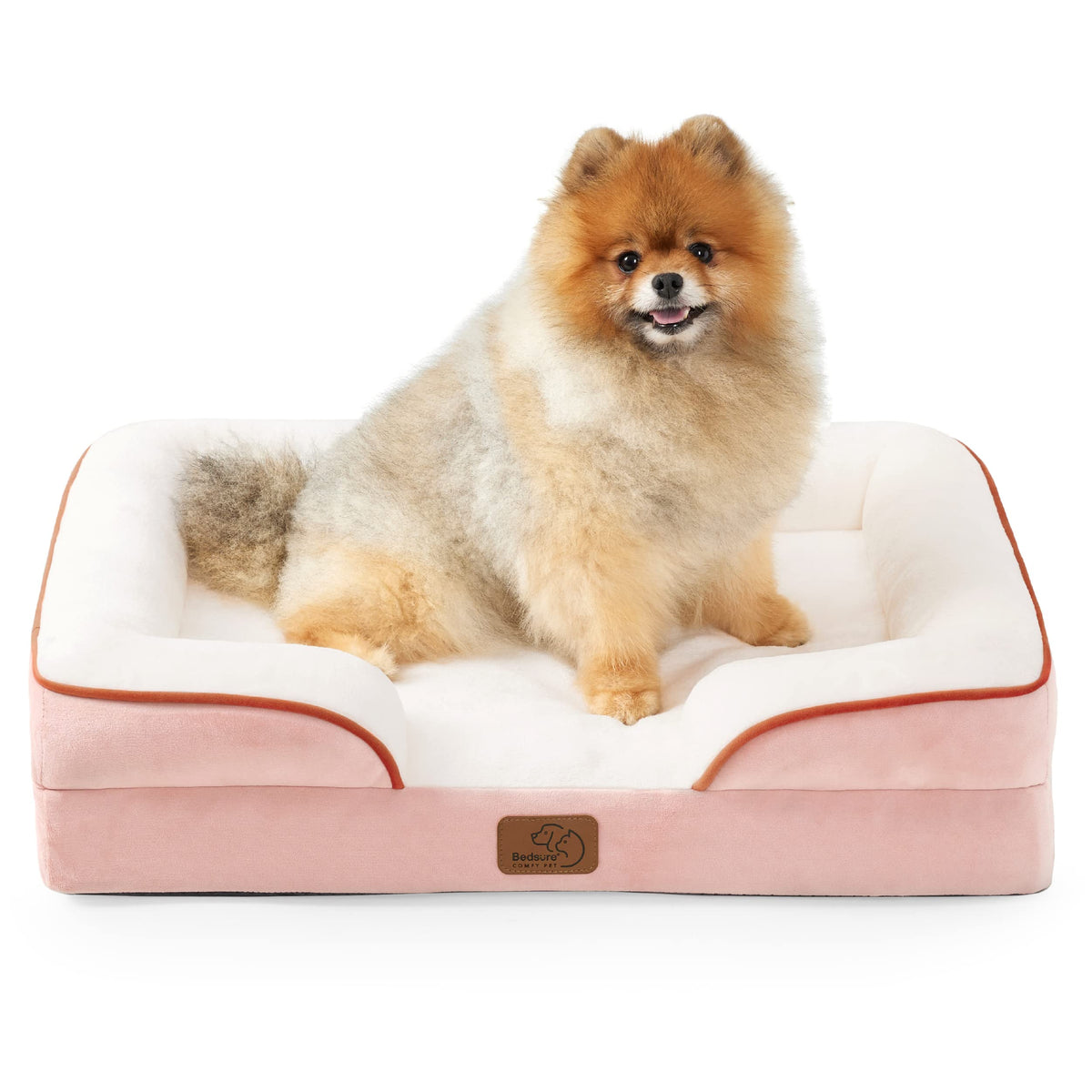 Bedsure small orthopedic dog bed in pink, front view showcasing supportive bolster for joint comfort.