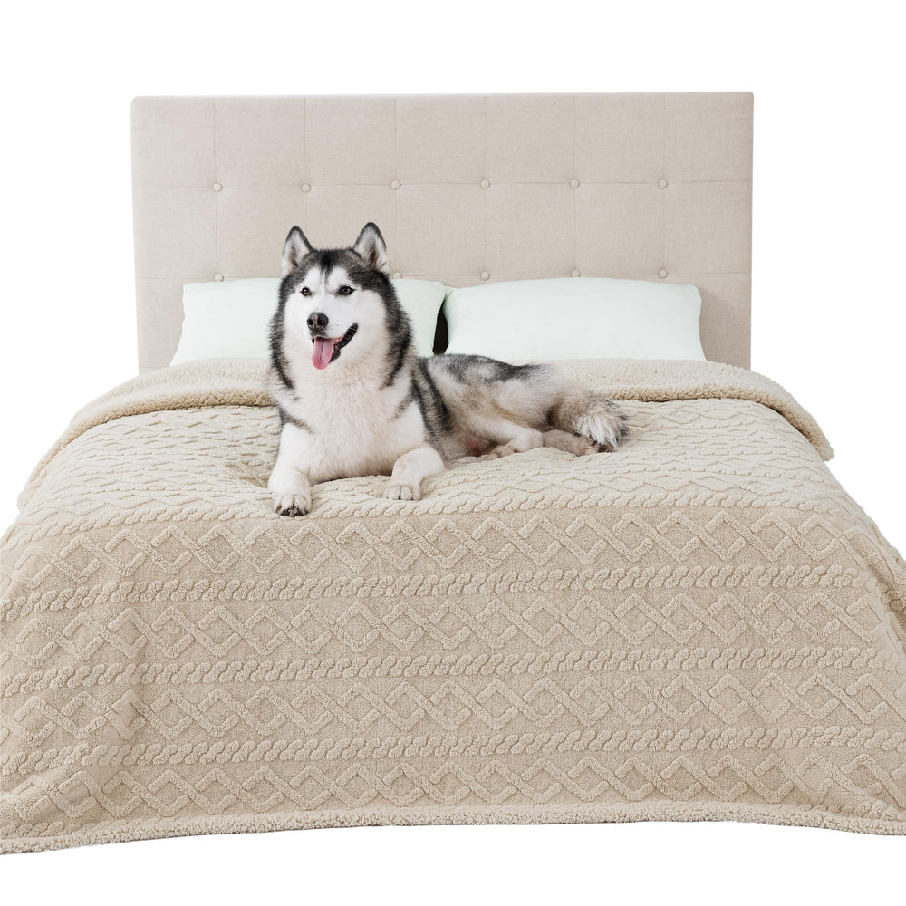 Bedsure waterproof dog blanket on a bed showing leakproof protection and comfort benefits.