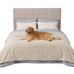 Bedsure waterproof dog blanket on bed protects against spills and accidents.
