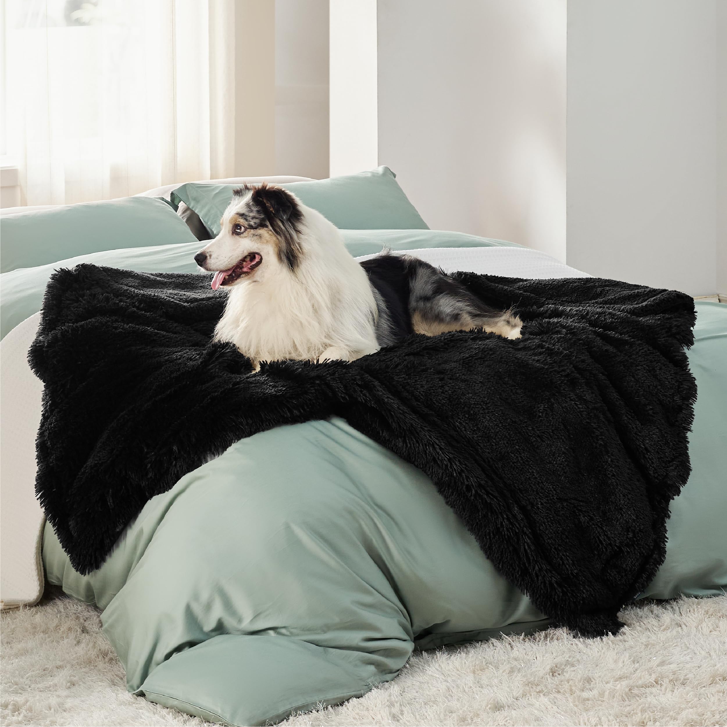 Bedsure dog blanket on couch protecting furniture from paws and spills
