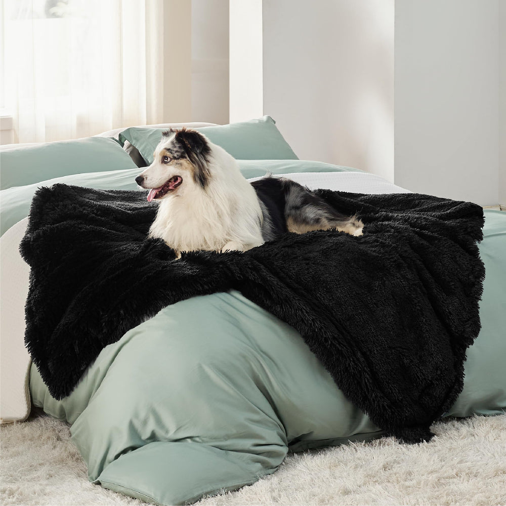 Bedsure dog blanket on couch protecting furniture from paws and spills