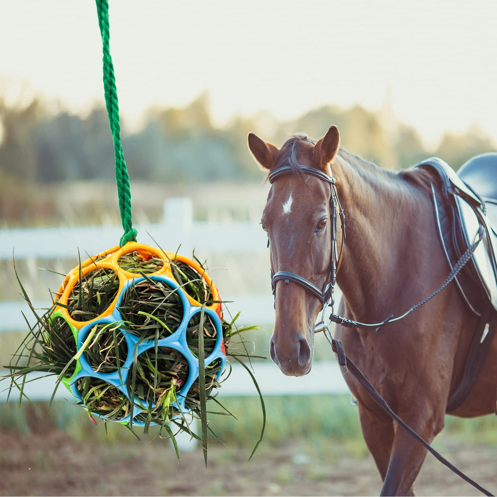 Besimple horse feeder ball hanging in stable red encourages playful feeding and exploration.