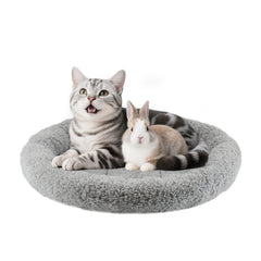 Billionchains round cat bed plush interior delivers cozy warmth for resting cats.