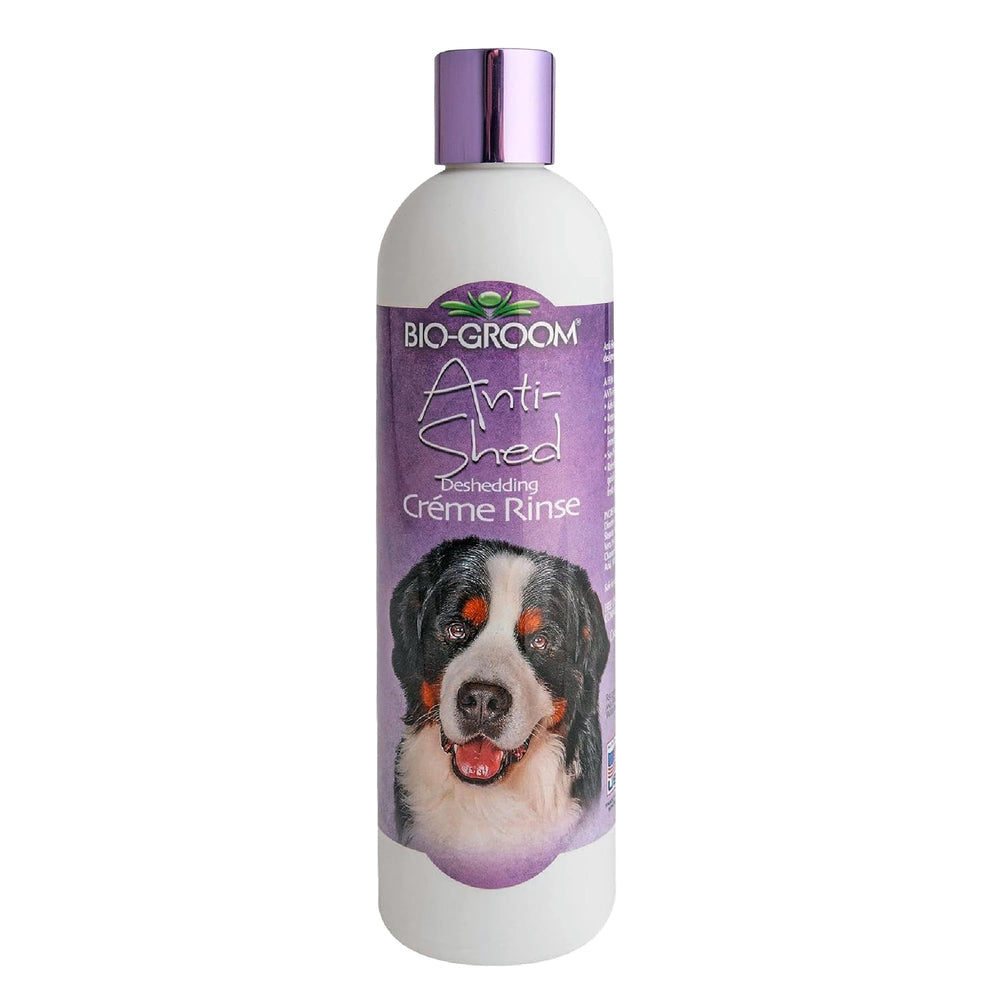 Bio-Groom Anti-Shed Deshedding Conditioner bottle highlights odor-eliminating care for long-haired dogs.