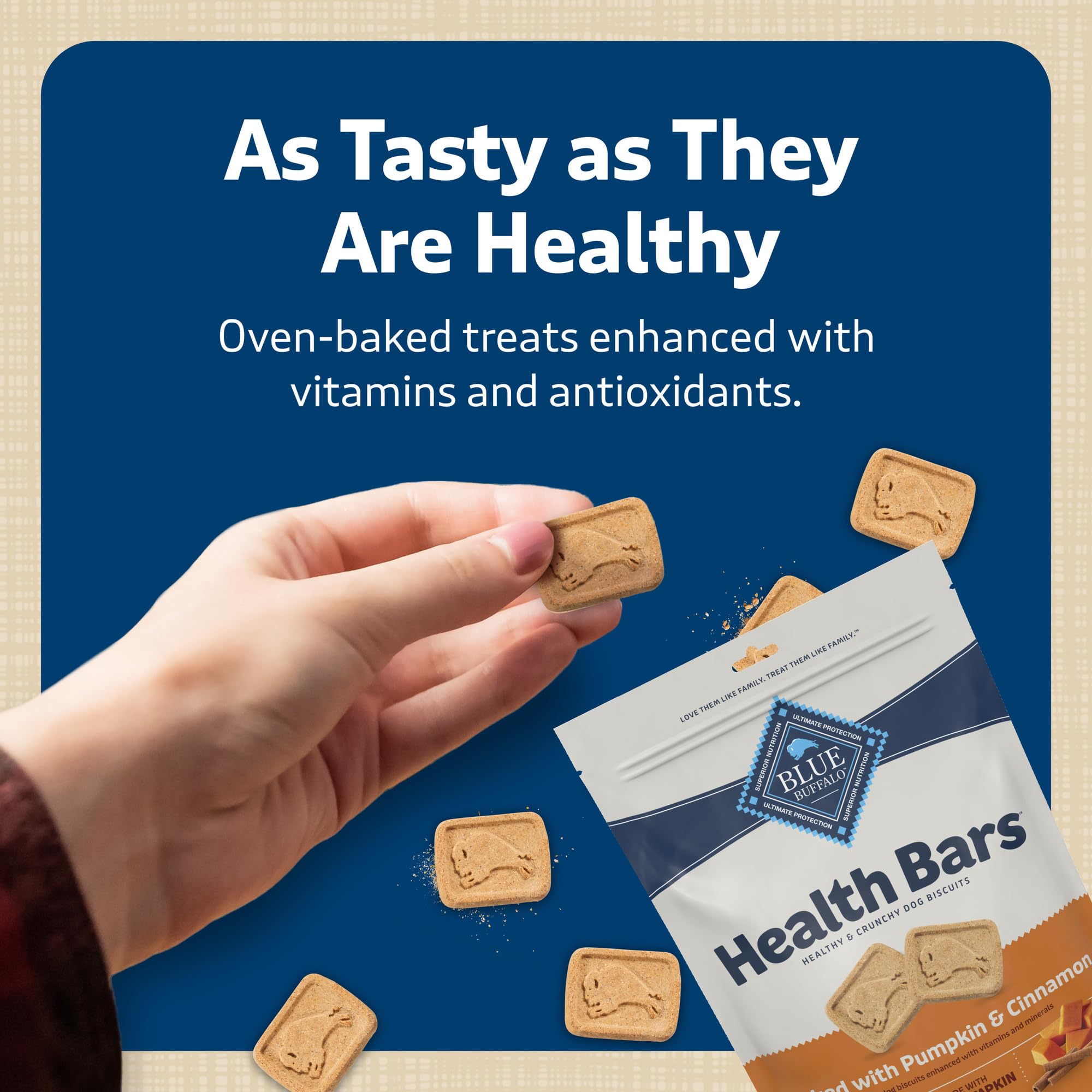 Blue Buffalo Health Bars dog enjoying crunchy treat during playtime.