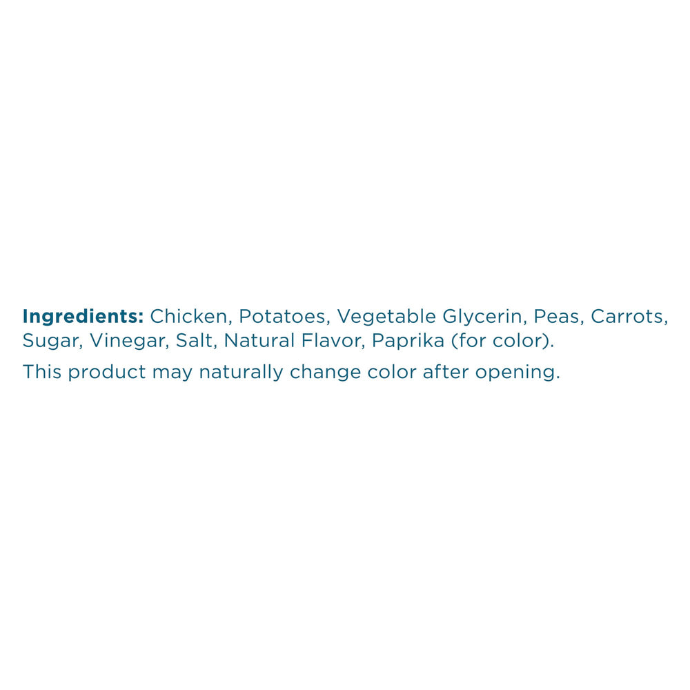 Blue Buffalo Nudges Homestyle Chicken ingredients close-up with peas and carrots.