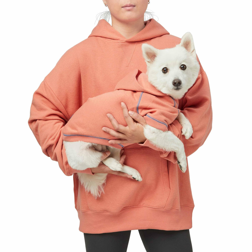 Blueberry Pet Essentials model wearing coral hoodie demonstrates park-ready warmth