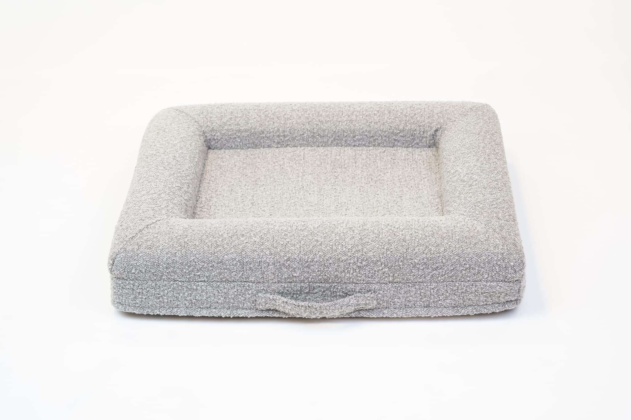 Bluewater Dog sand-color bed blends with home interiors.