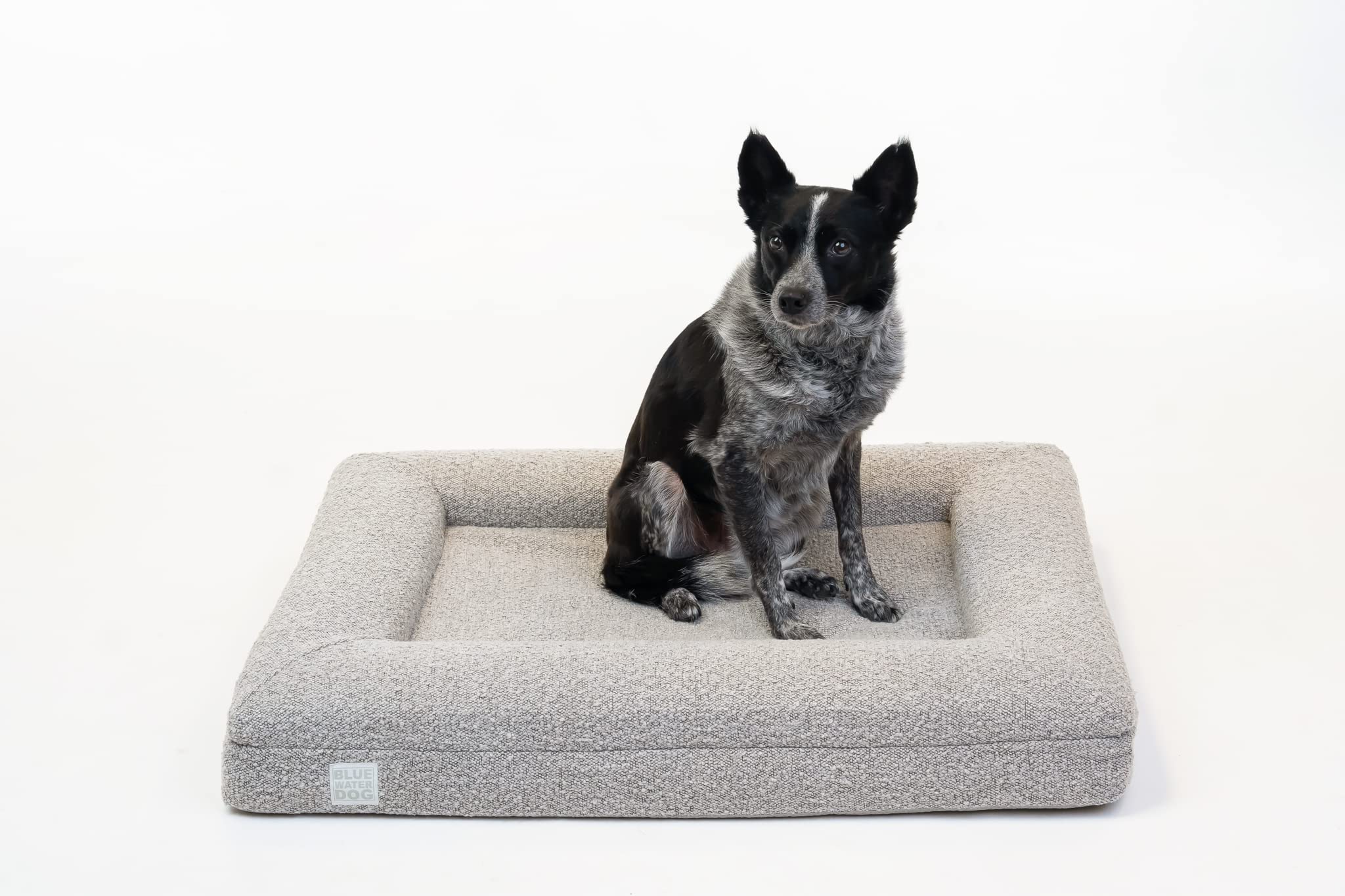 Bluewater Dog boucle fabric detail highlighting stylish, durable exterior.