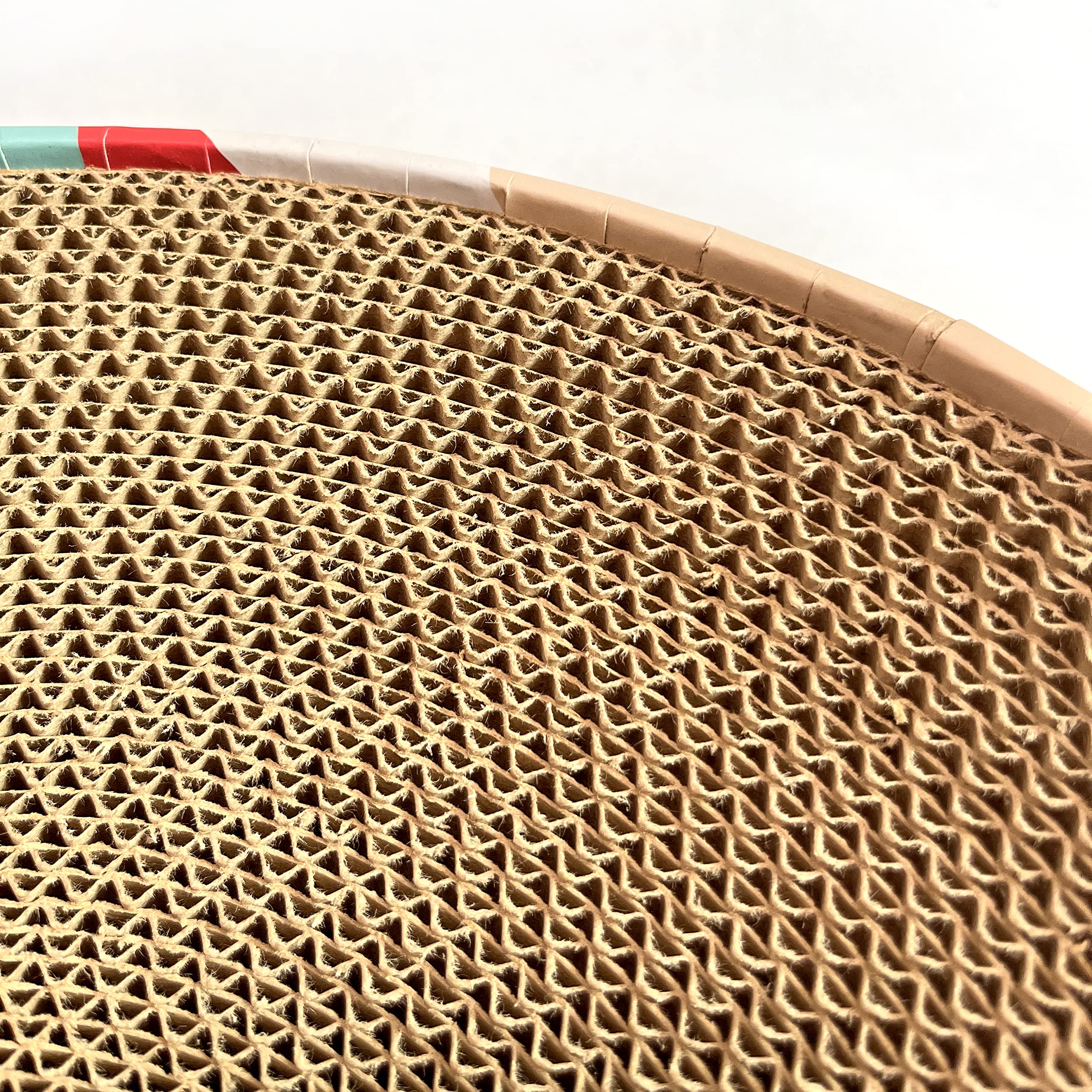 BobbyPet Cat Scratcher Lounge Bed also serves as a comfy bed for naps.