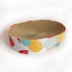 BobbyPet Cat Scratcher Lounge Bed inside scratching box keeps play contained.