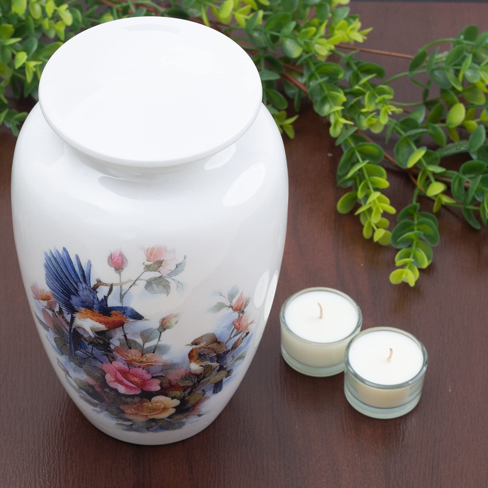 BOLD & DIVINE birds-floral-urn-full-view presents an elegant memorial urn for display.