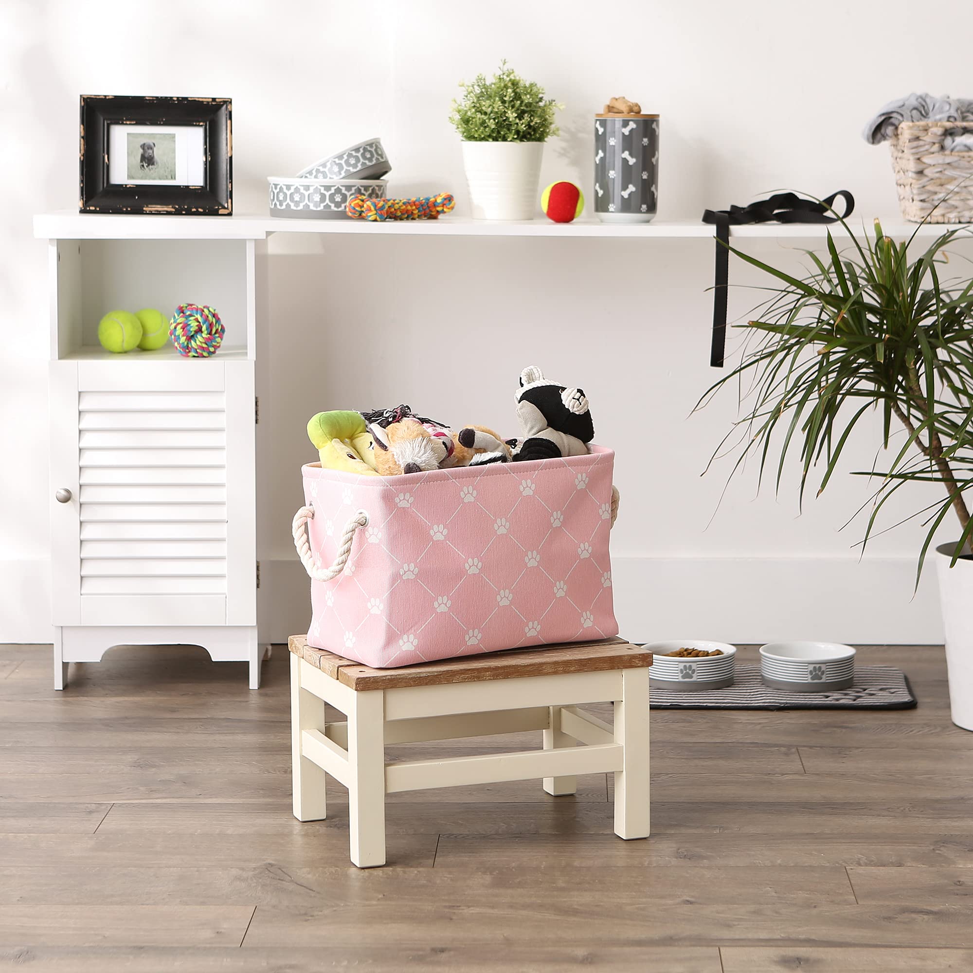 Bone Dry paw and bone pink bin stores treats and dry goods in tidy space.