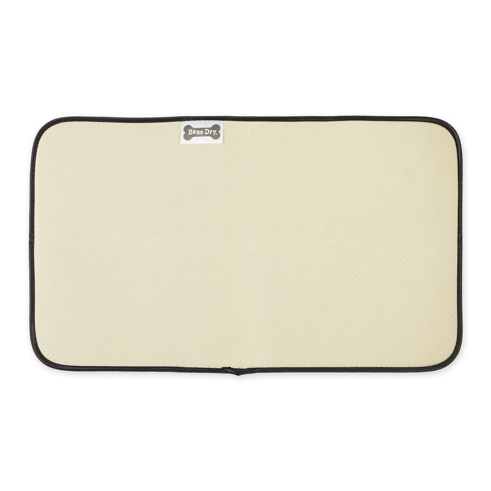 Bone Dry pet mat in crate demonstrates spill containment and dry crate interior.