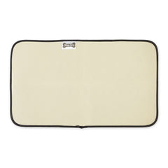 Bone Dry pet mat in crate demonstrates spill containment and dry crate interior.