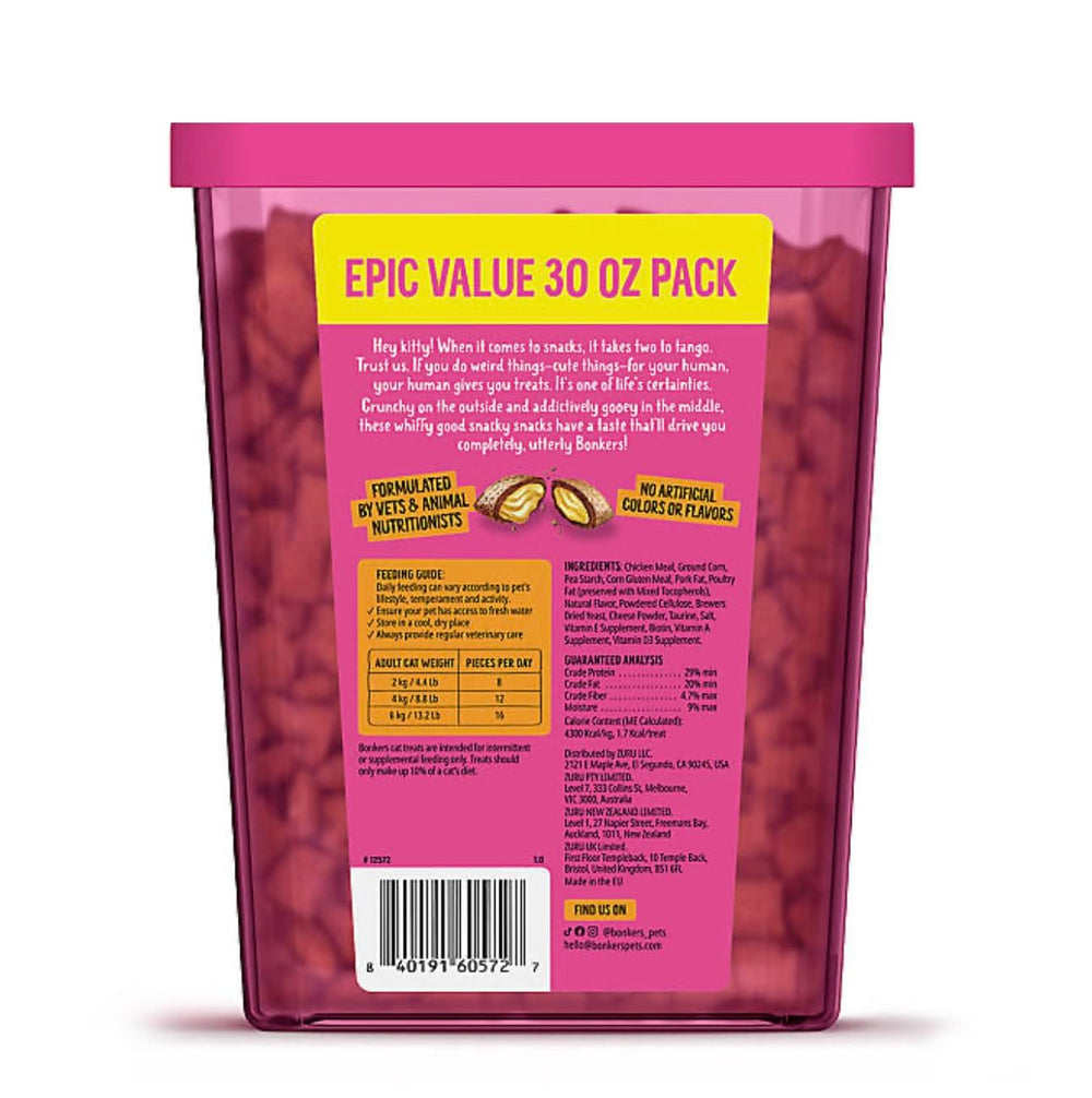 Bonkers Paw Lickin' Chicken Treats dual texture closeup showcases crunchy shell and gooey center for flavor.