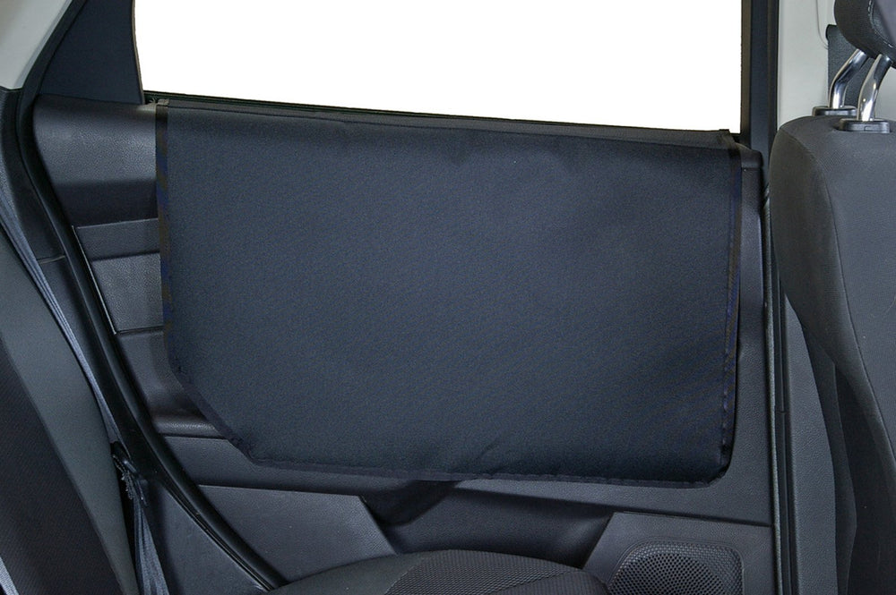 Bushwhacker Vehicle Door Protector shows dogs on the door edge, preventing scratches and dirt.