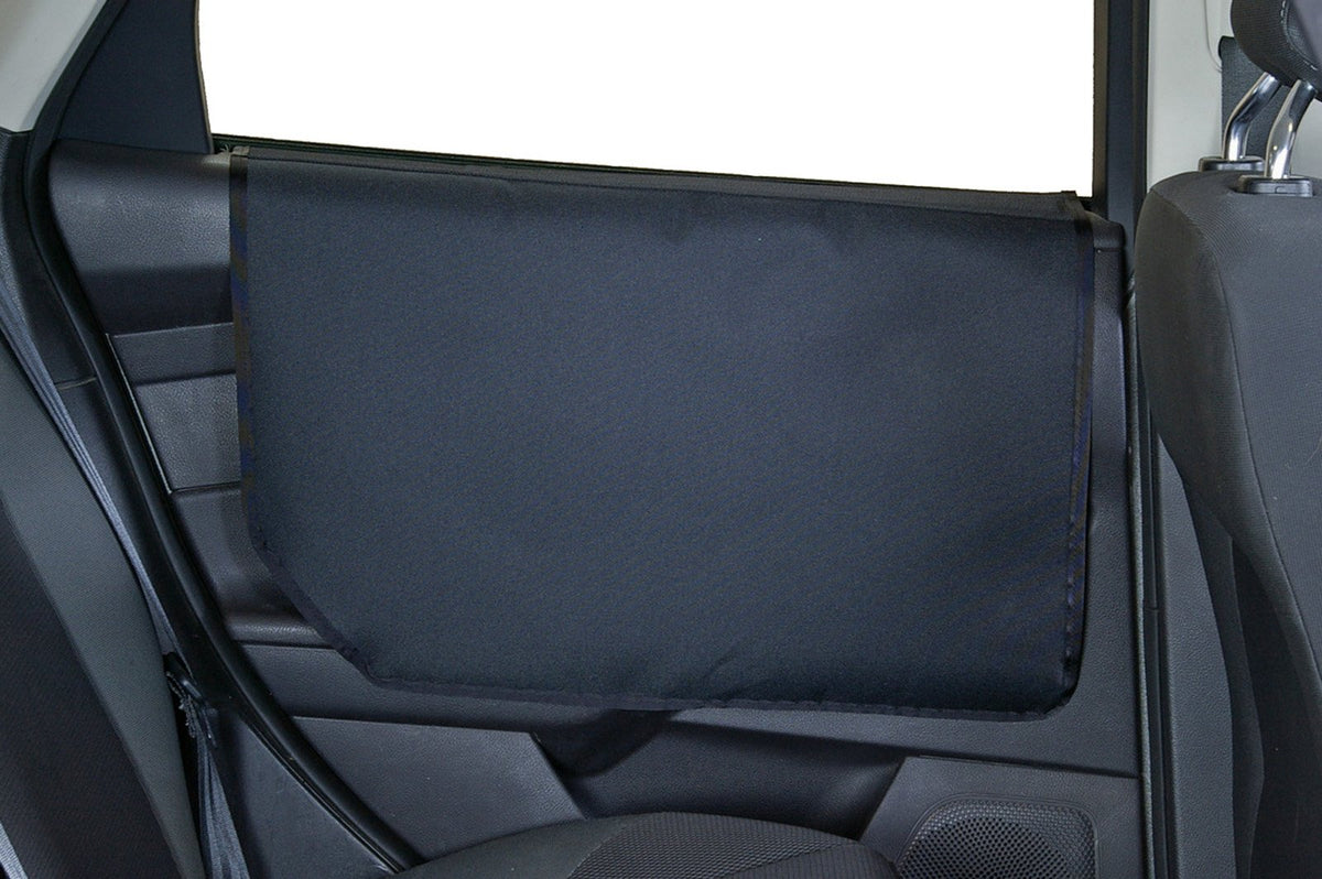 Bushwhacker Vehicle Door Protector shows dogs on the door edge, preventing scratches and dirt.