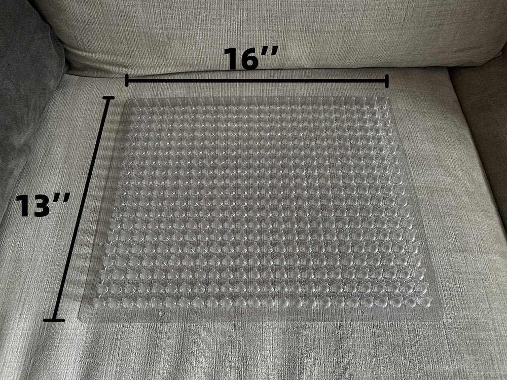BYTEBAY couch protection setup on sofa using scat mats for furniture safety.