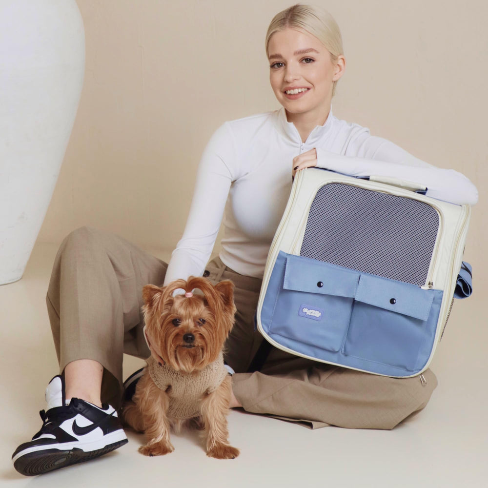 Carry Me Please blue cat carrier backpack quick-access pocket for essentials.