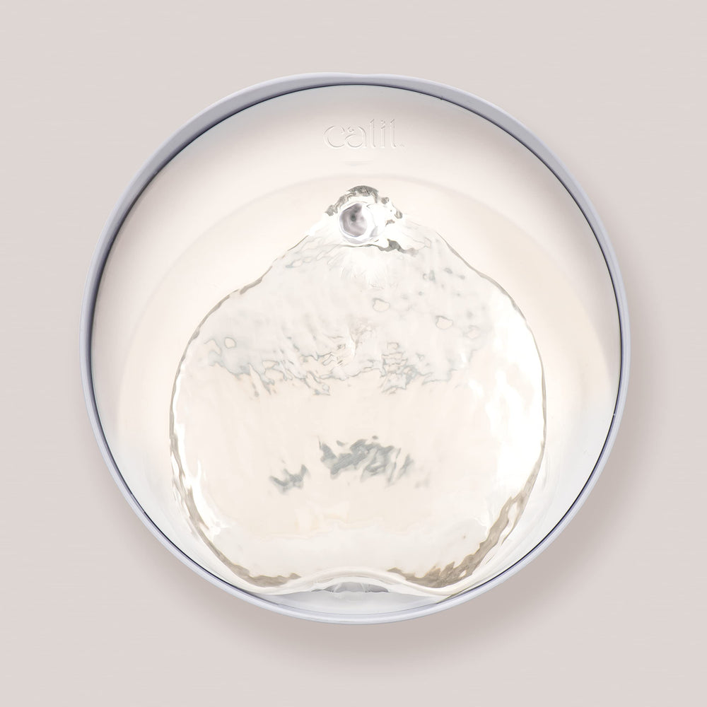 Catit PIXI triple-filter system cleans water and reduces odors.