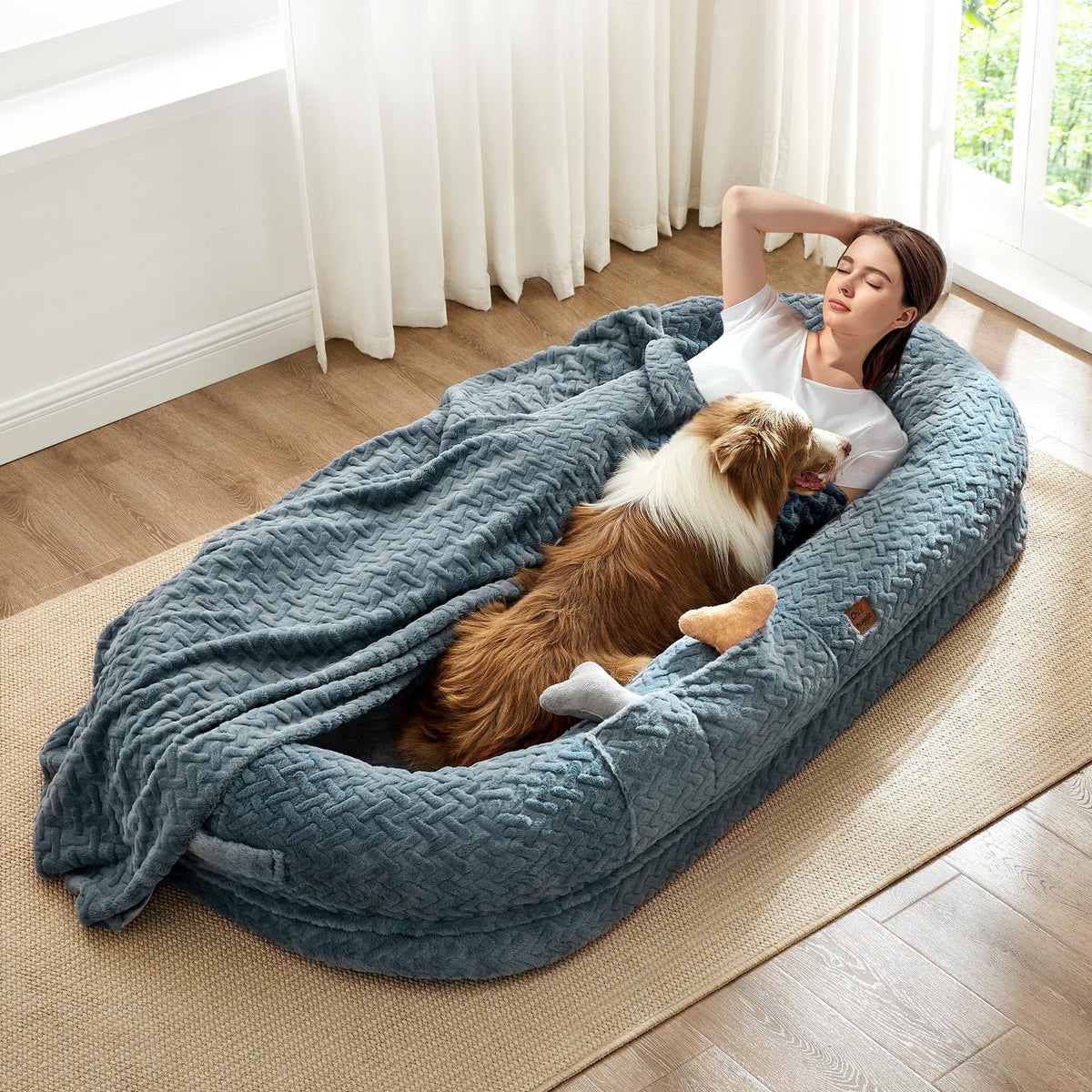 ChiXnuggle human dog bed cover with plush chevron fabric for cozy lounging.