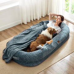 ChiXnuggle human dog bed cover with plush chevron fabric for cozy lounging.
