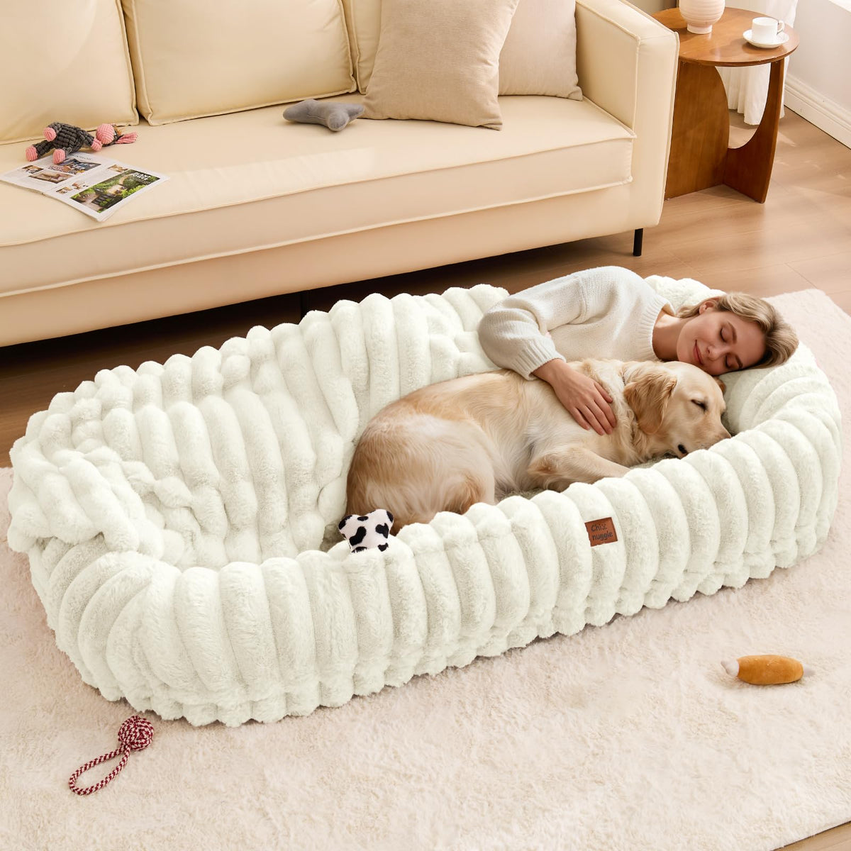 ChiXnuggle Human Dog Bed features striped fabric for cozy lounging at home.