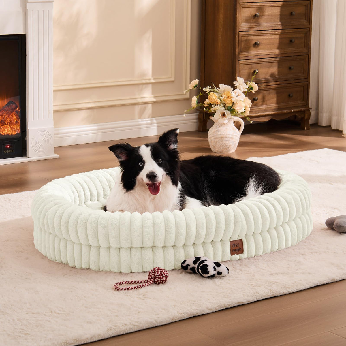 ChiXnuggle XL dog bed cream front view shows plush faux fur for calm naps
