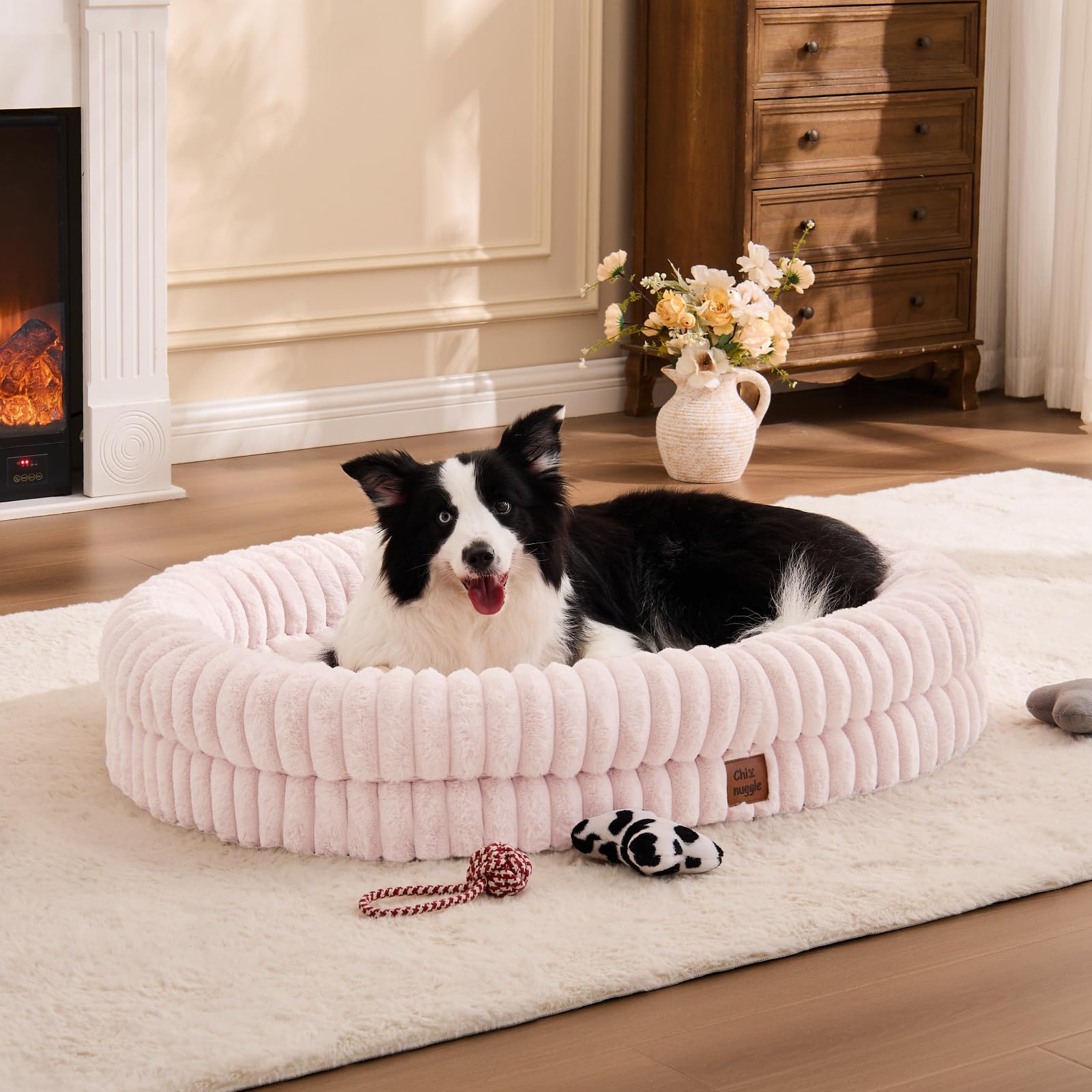 ChiXnuggle XL dog bed striped faux fur pink – luxurious lounging surface for cozy naps