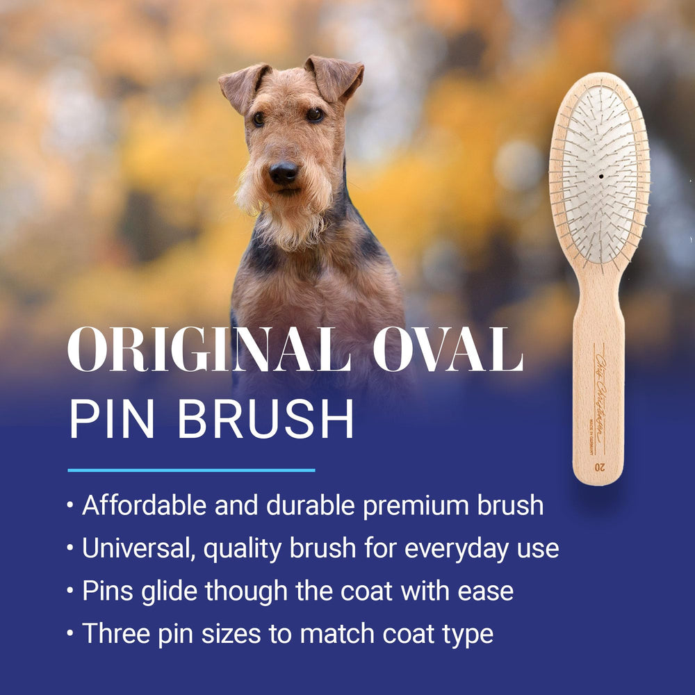 Chris Christensen 20 mm oval pin brush side view emphasizes ergonomic beech wood handle for comfortable grooming