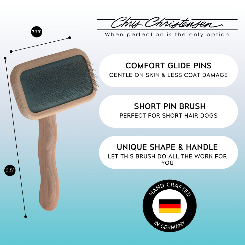Chris Christensen Mark II Slicker Brush shows stainless pins for smooth coat grooming.