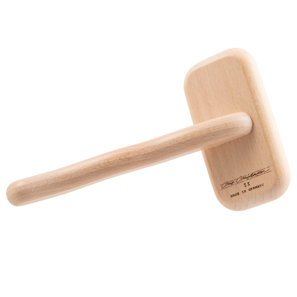 Chris Christensen Mark II Slicker Brush features ground polished tips for snag-free brushing.