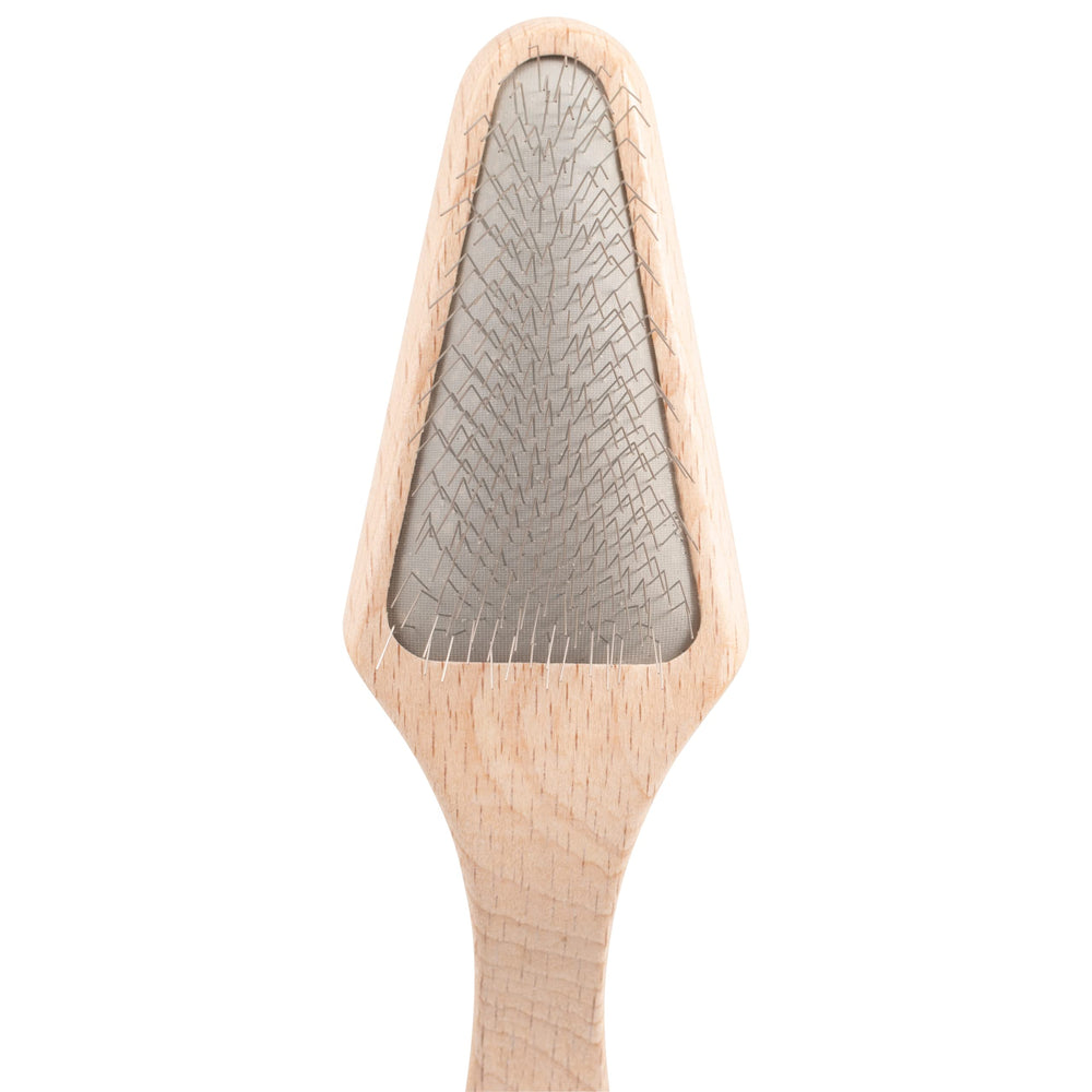 Chris Christensen Mark V slicker gliding through a delicate coat for smooth grooming