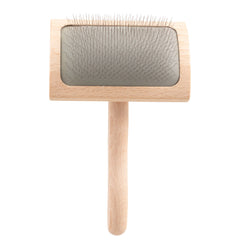 Chris Christensen Mark VI curved slicker brush close-up showing stainless pins for gentle detangling
