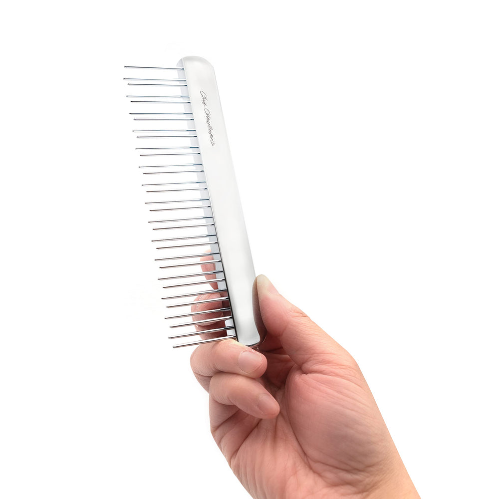 Chris Christensen NTS Staggered Buttercomb 6in during a professional grooming session