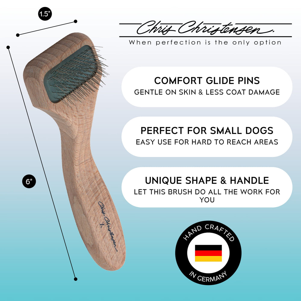Chris Christensen A5X Mark X Slicker Tiny Head grip shows ergonomic handle for comfortable grooming.