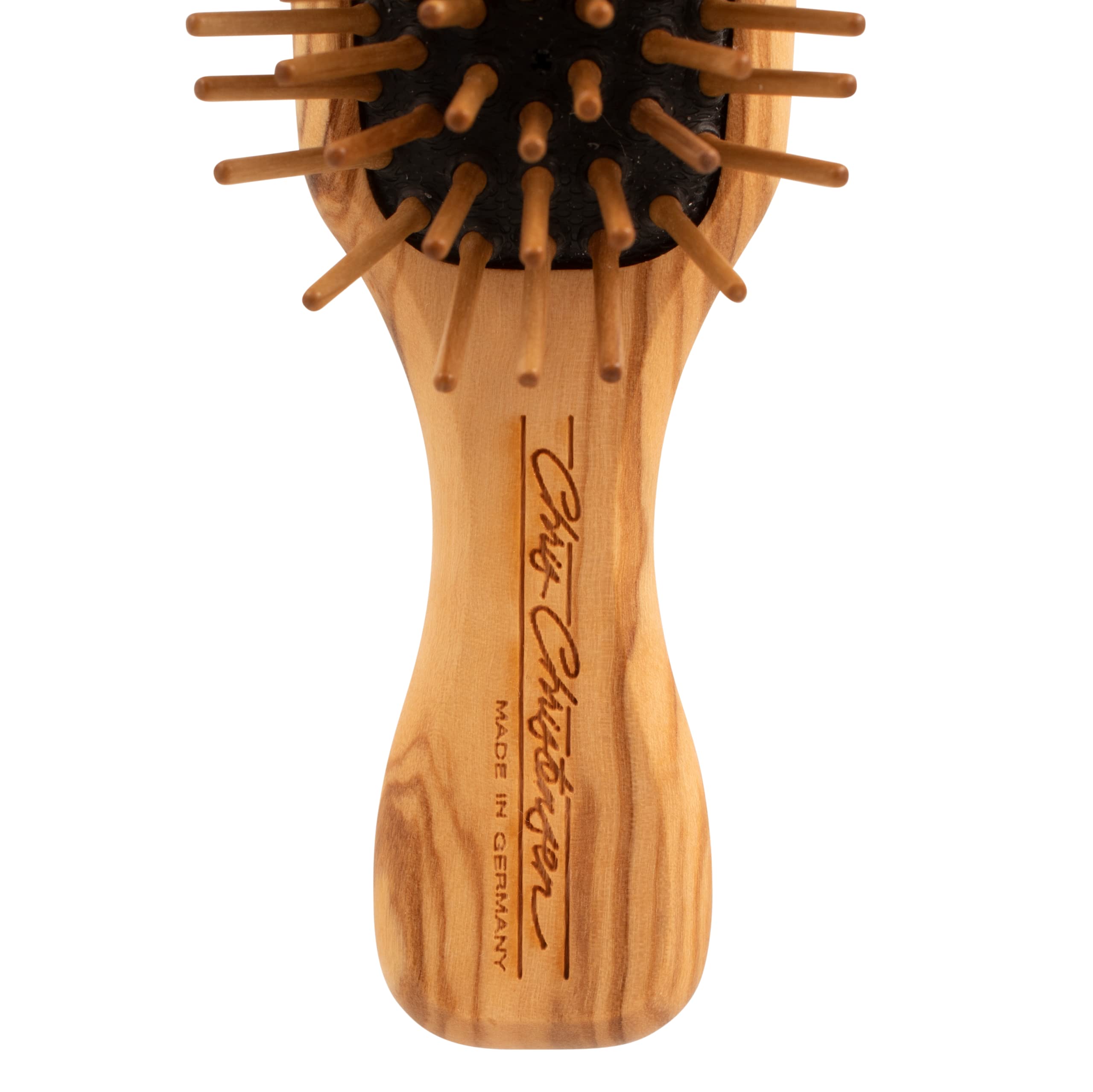 Chris Christensen Static-free brush showing no static cling during brushing session.