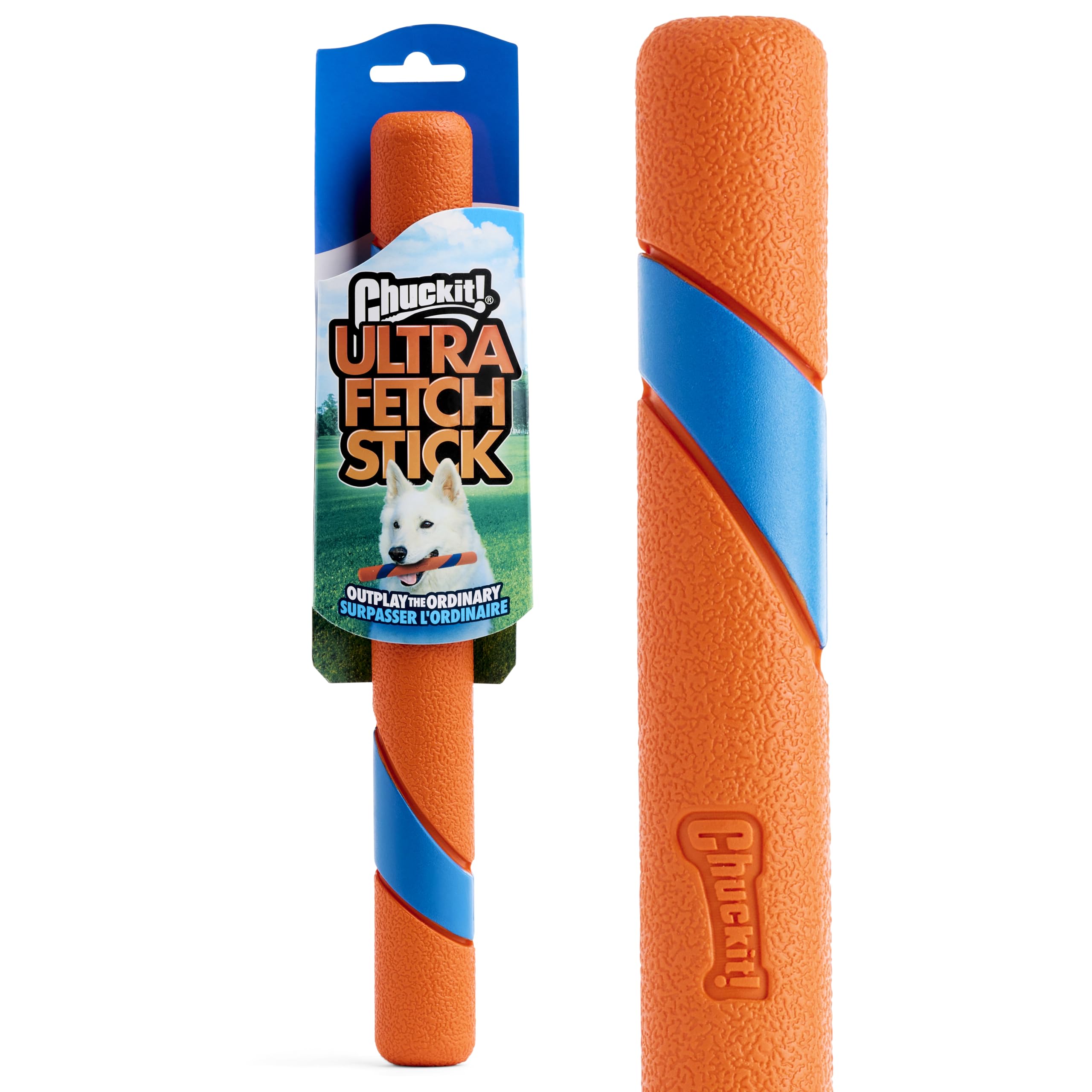 Chuckit! Ultra Fetch Stick 12-inch visible in grass for easy retrieval.