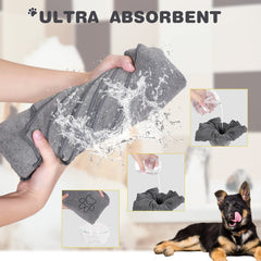 Chumia dog towel in use drying a dog, showing fast absorption capability