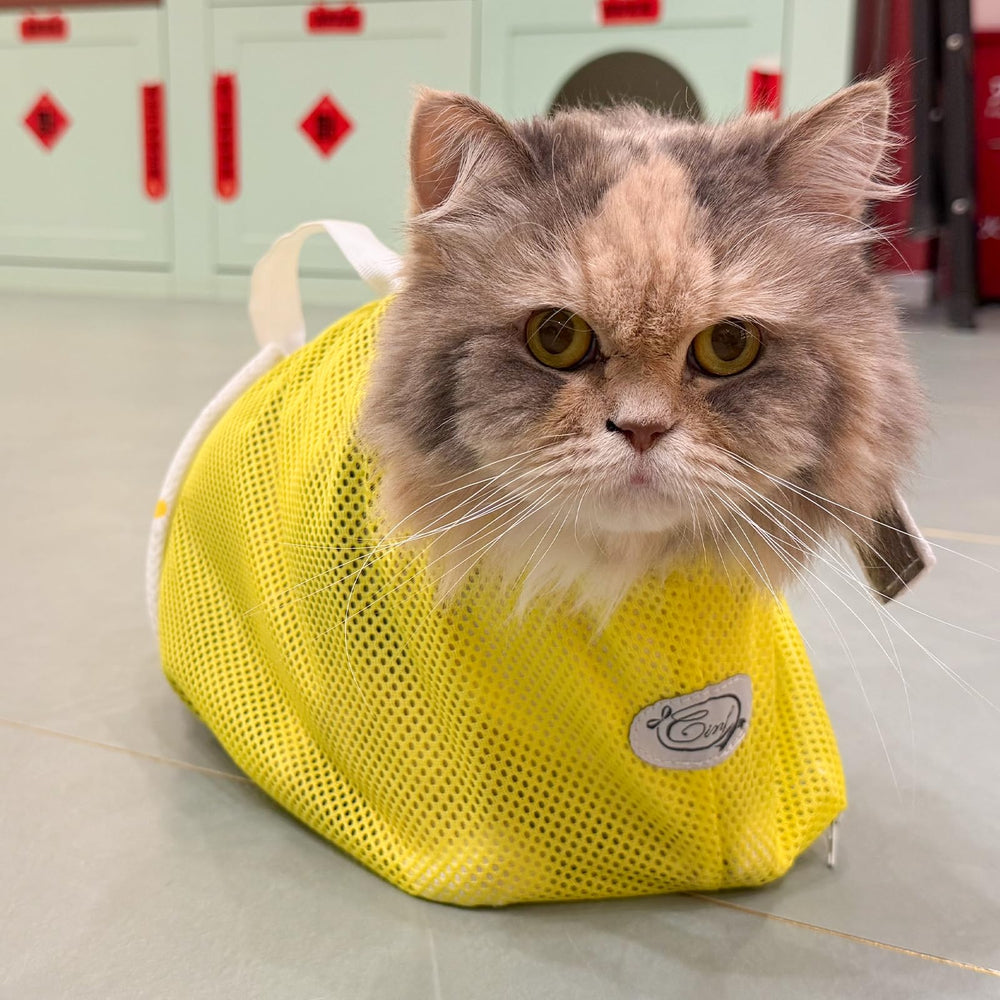 Cinf cat bathing bag features adjustable straps for a snug fit during grooming.