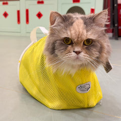 Cinf cat bathing bag features adjustable straps for a snug fit during grooming.