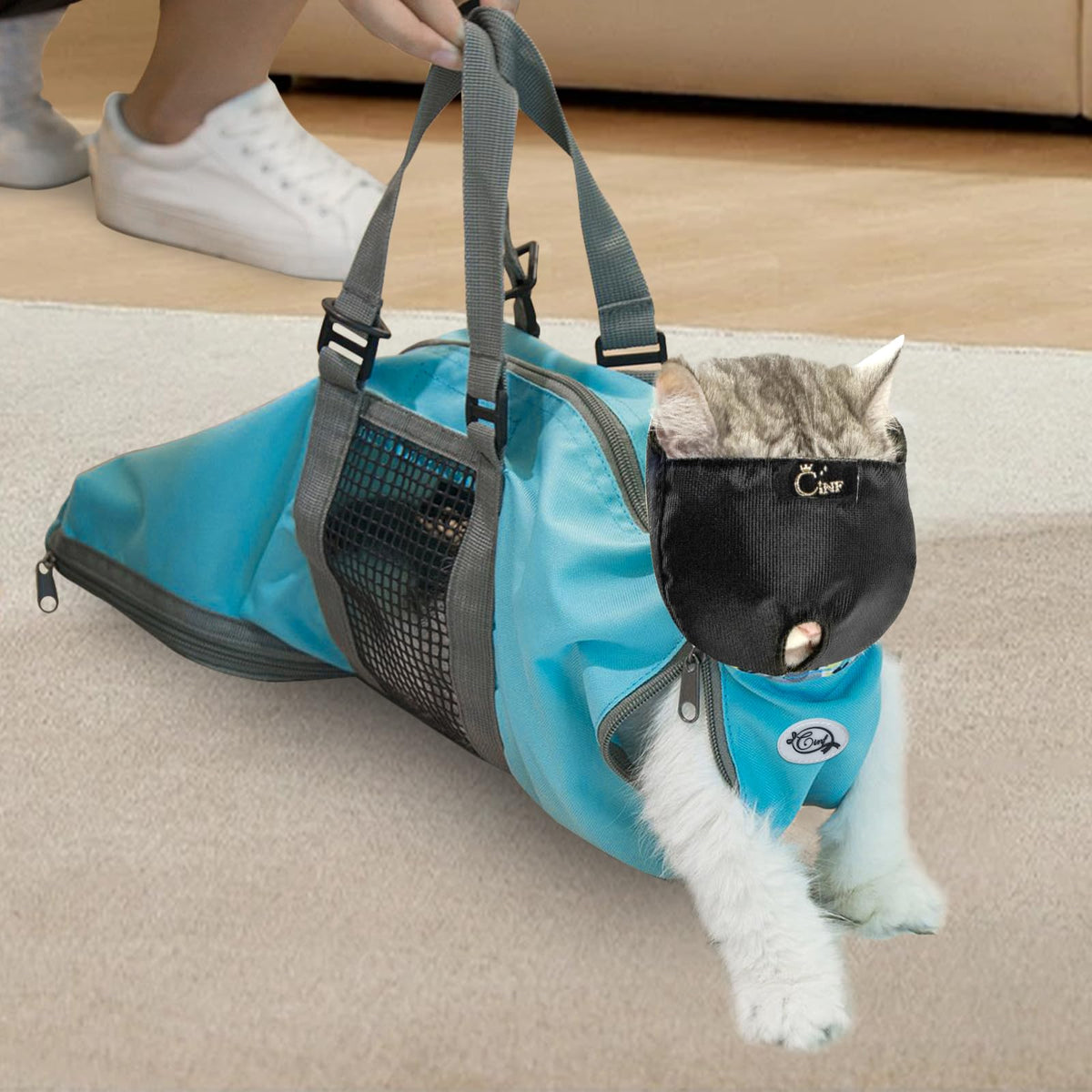 Cinf cat-nail-clipping-bag blue-muzzle: safe nail trimming during grooming.