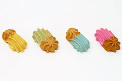 Claudia's Canine Peanut Butter Goobers Pastel cookies half-dipped with pastel colors for treats.