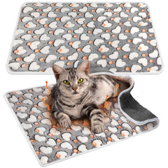 Clysee self warming cat pad in crate offers cozy warmth without cords.