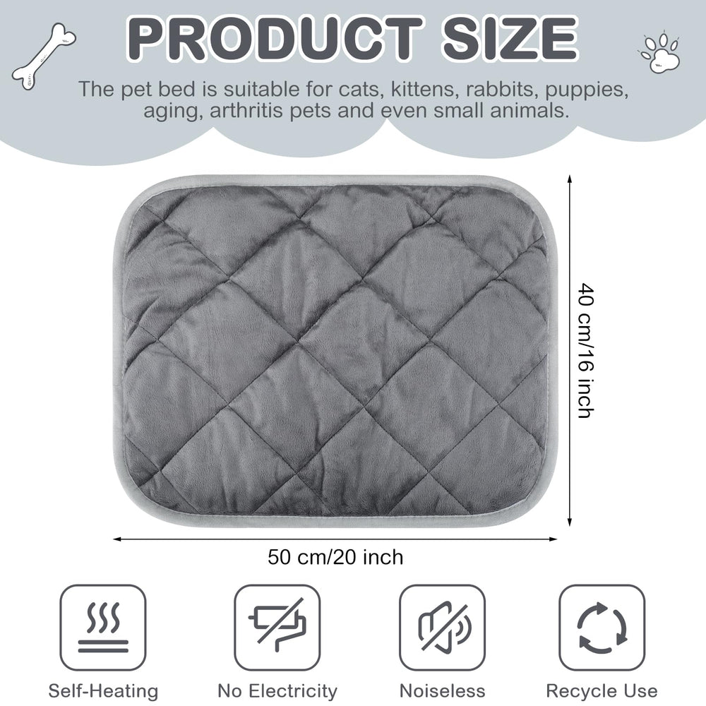 Clysee self-warming dog mat on sofa offers a snug resting spot.