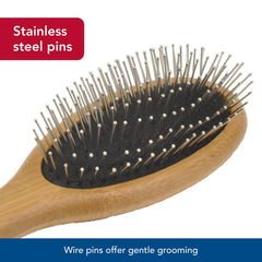 Coastal Pet Safari wire-pin brush gliding through long coat for even oil distribution.