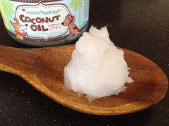 CocoTherapy breath-freshness image features a happier dog after coconut oil