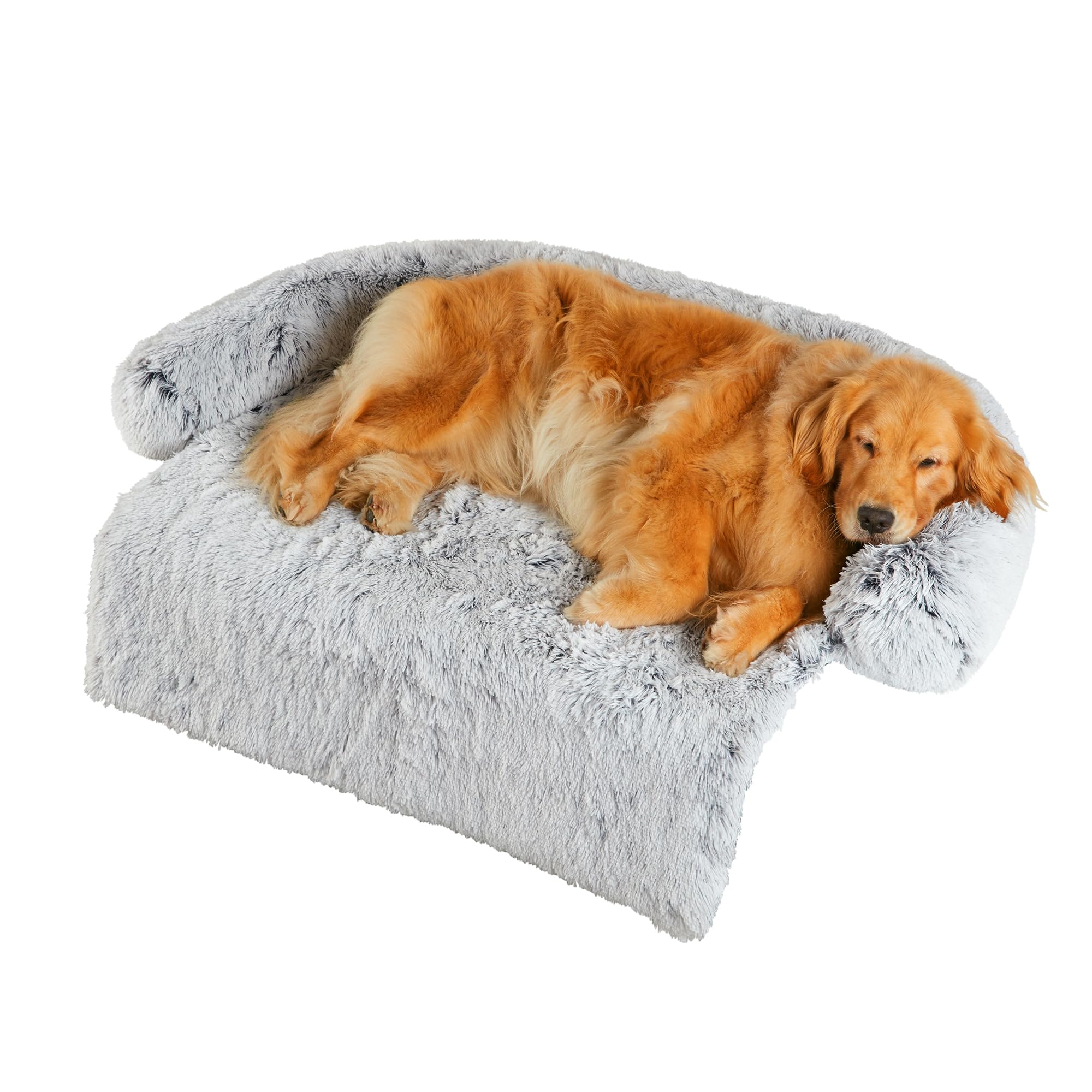 Codi large calming dog bed on couch offers cozy retreat for anxious dogs.