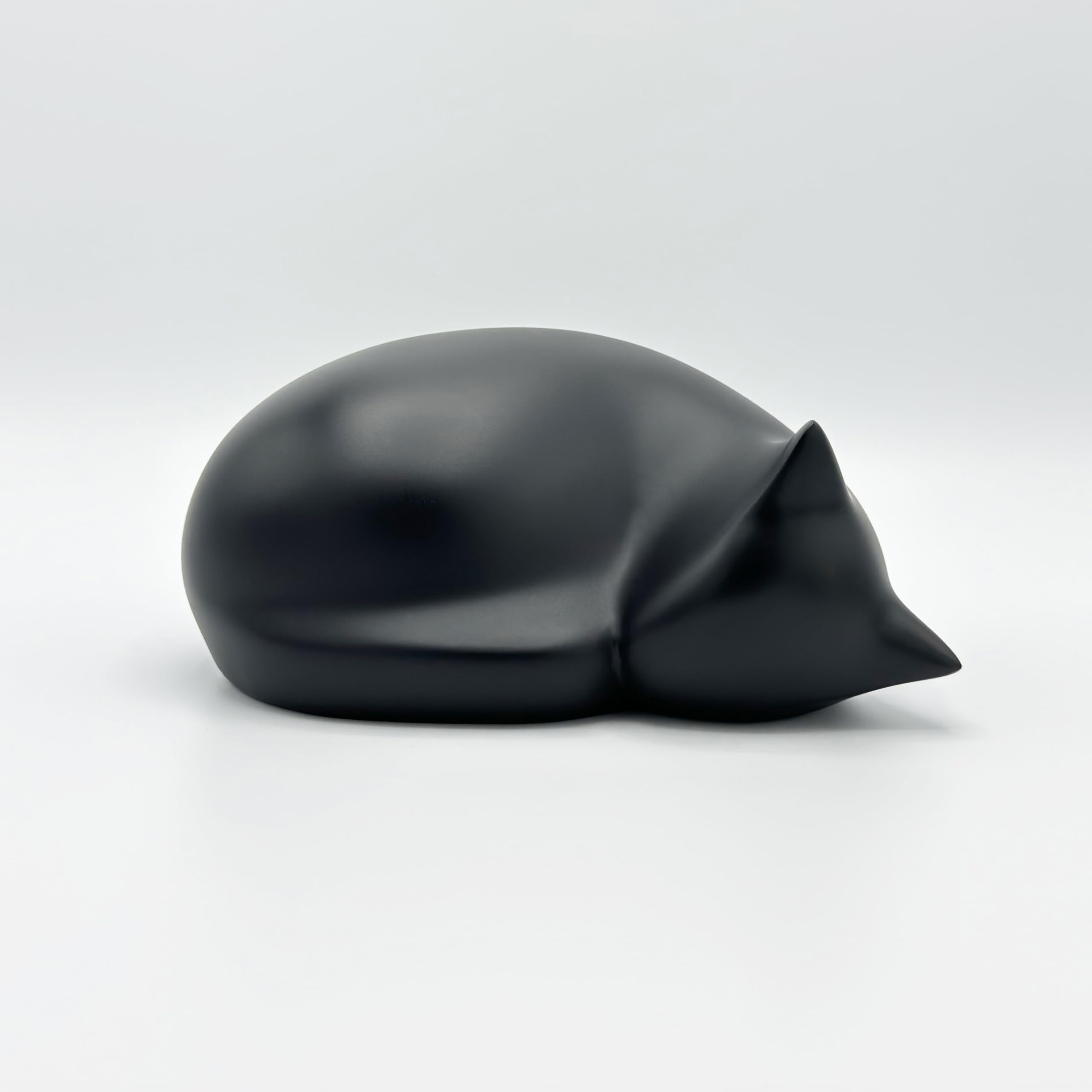 Comemori sleeping cat urn black packaging, protective shipping for safe arrival